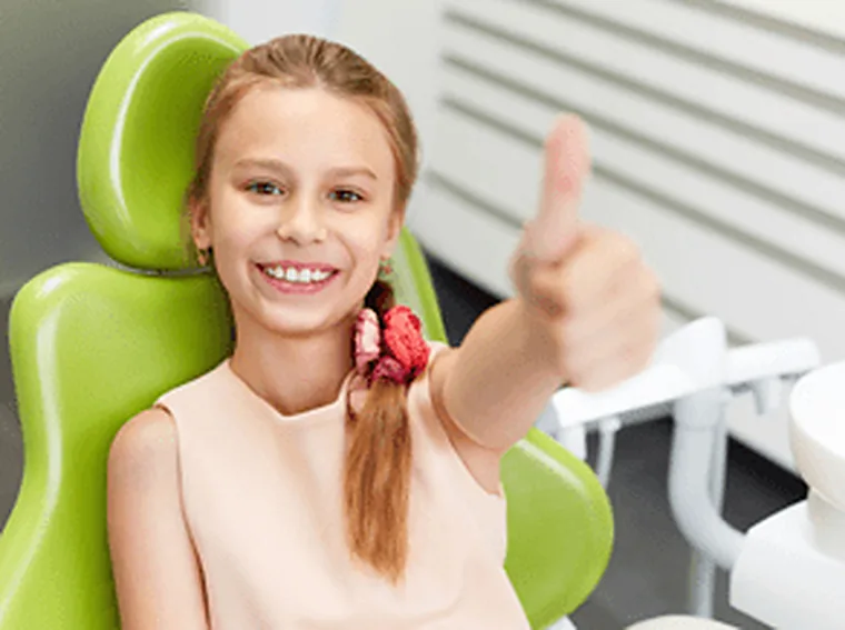 A child in the dental chair.