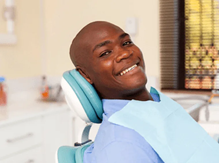 A patient lying relaxed in the dental chair.